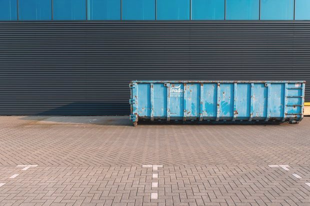 Roll-off dumpster delivered to a suburban property